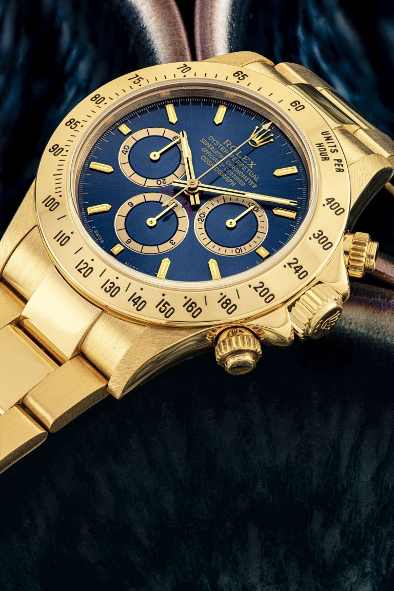 Kỳ Lân Luxury rolex daytona ref 16528 in yellow gold with a blue dial Chiêm ngưỡng những tác phẩm tuyệt tác thời gian xuất hiện ở phiên đấu giá thập kỷ của Christie’s (PHẦN 2)