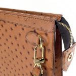 Túi clutch da đà điểu màu cam đất