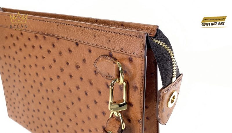 Túi clutch da đà điểu màu cam đất