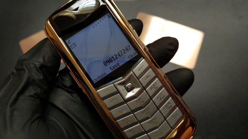 Vertu Constellation bọc vàng da nâu