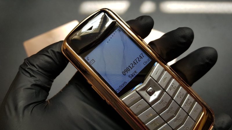 Vertu Constellation bọc vàng da nâu