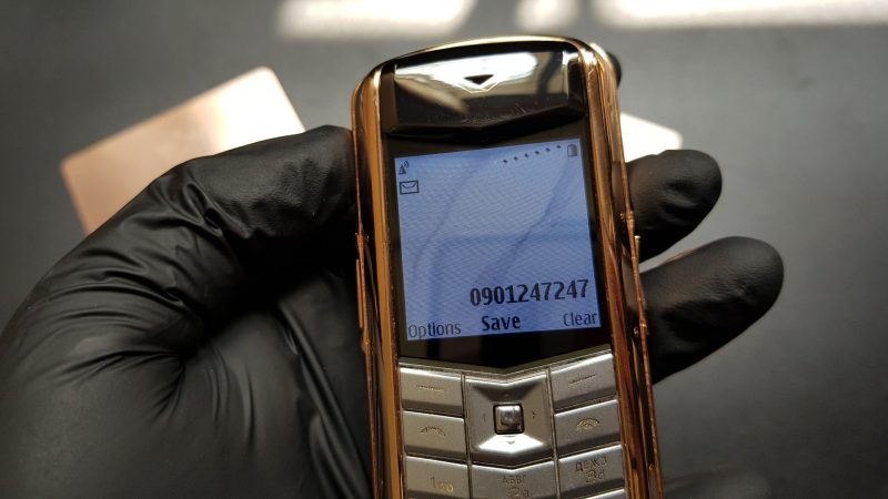 Vertu Constellation bọc vàng da nâu