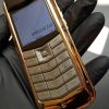 Vertu Constellation bọc vàng da nâu