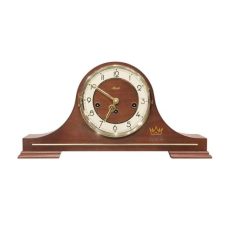Đồng hồ Hermle 21092-030340 có phần vỏ được làm từ gỗ óc chó cao cấp, mặt số La Mã mạ vàng và họa tiết in nổi tinh xảo