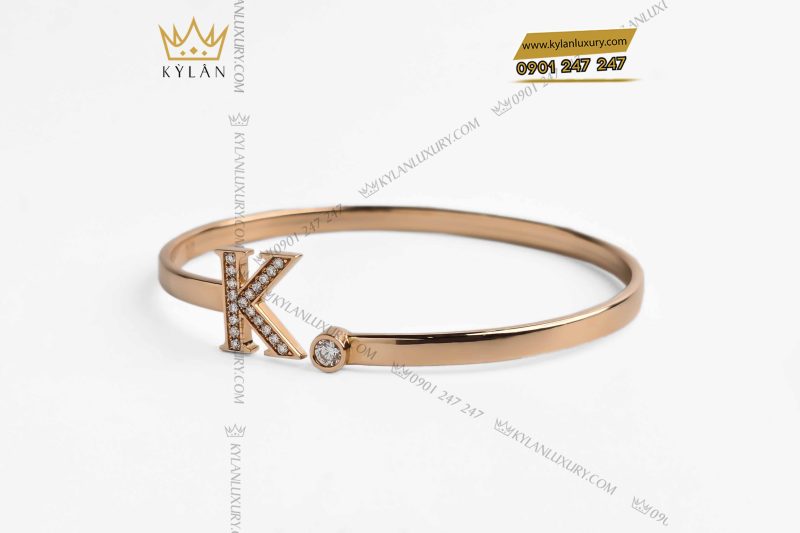 Vòng tay chữ K vàng hồng nguyên khối Au750 đính kim cương
