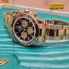 Đồng hồ Rolex Cosmograph Daytona 40 126508-0002 mặt đen vàng Champagne