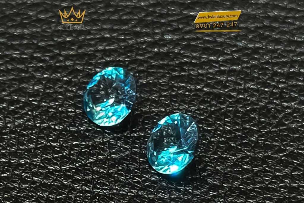 Kỳ Lân Luxury cap da quy topaz xanh bien Cặp đá quý Topaz Xanh Biển