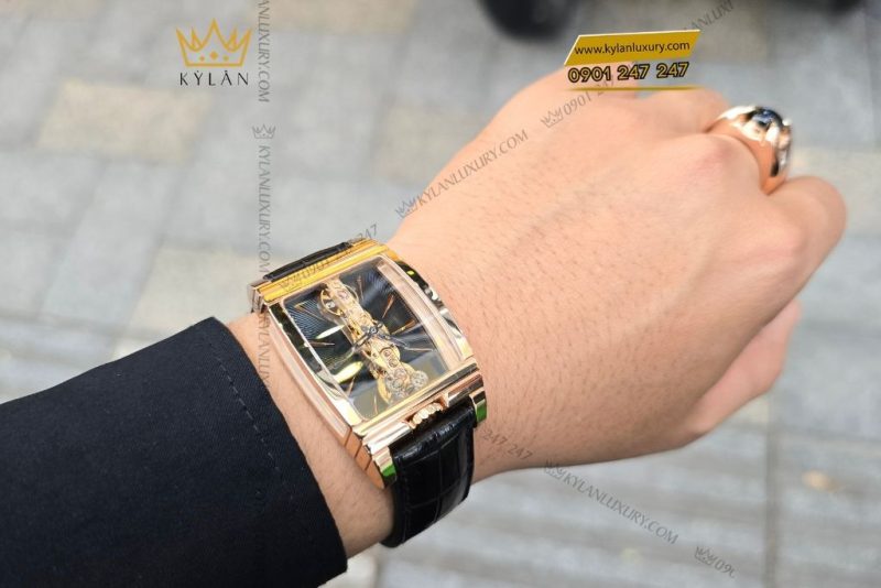 Đồng hồ Corum Golden Bridge vàng hồng mặt số đen lộ cơ