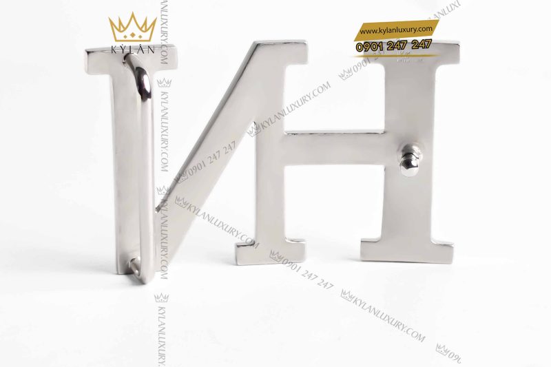 Mặt thắt lưng vàng trắng nguyên khối Au750 chữ HN