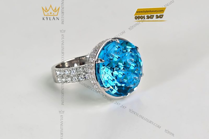 Nhẫn vàng trắng nguyên khối Au750 đính viên chủ đá quý Topaz