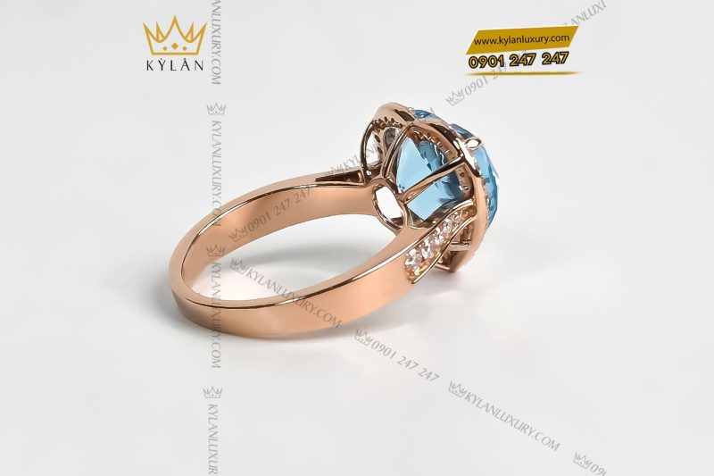 Nhẫn vàng nguyên khối Au750 đính đá Topaz hình trái tim