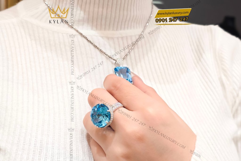 Nhẫn vàng trắng nguyên khối Au750 đính viên chủ đá quý Topaz 5 Nhẫn vàng trắng nguyên khối Au750 đính viên chủ đá quý Topaz