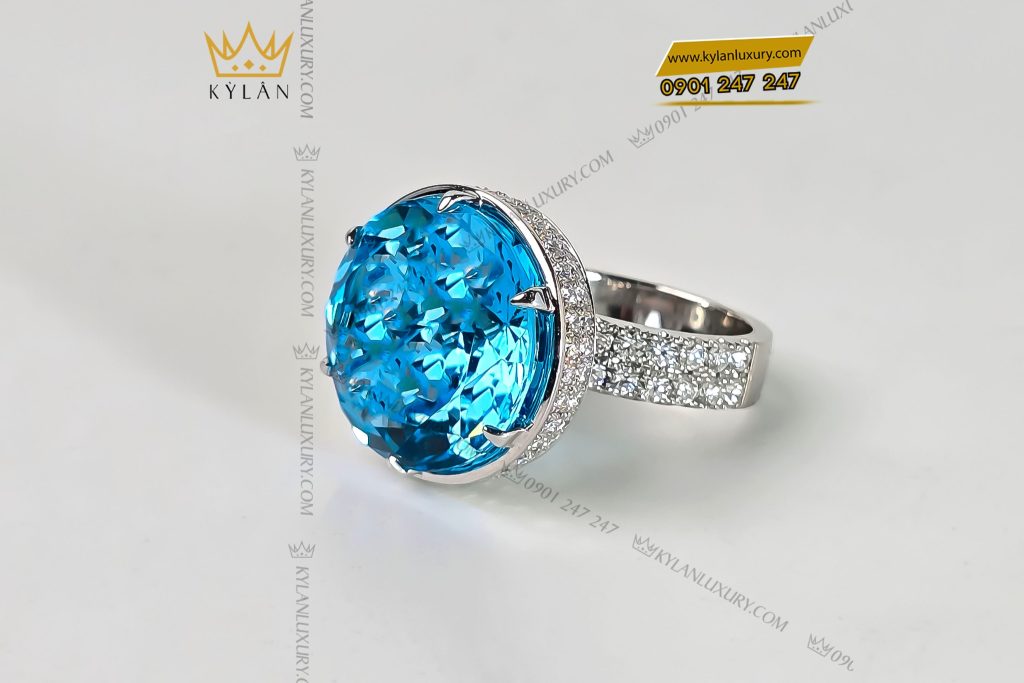 Nhẫn vàng trắng nguyên khối Au750 đính viên chủ đá quý Topaz 2 Nhẫn vàng trắng nguyên khối Au750 đính viên chủ đá quý Topaz