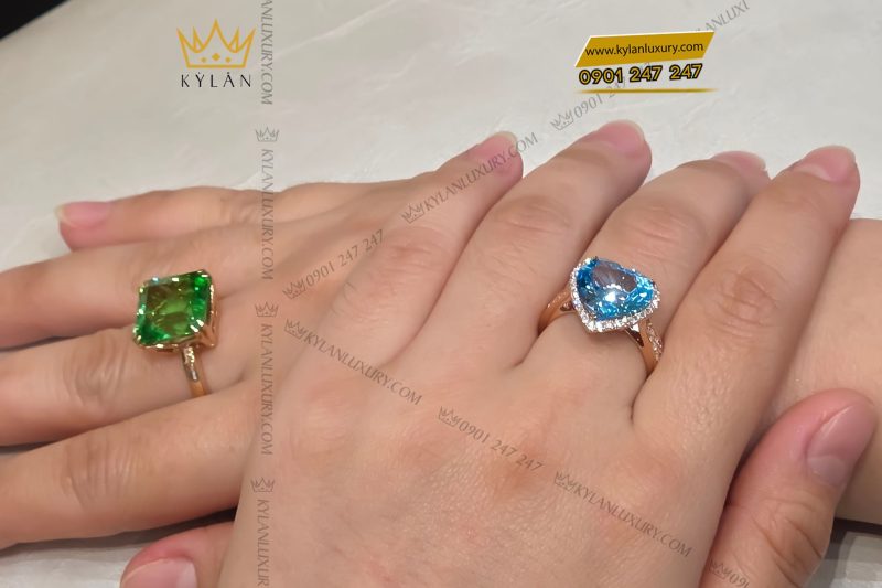 Nhẫn vàng nguyên khối Au750 đính đá Topaz hình trái tim