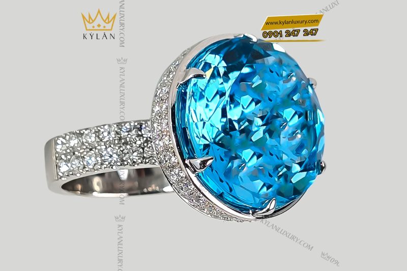 Nhẫn vàng trắng nguyên khối Au750 đính viên chủ đá quý Topaz
