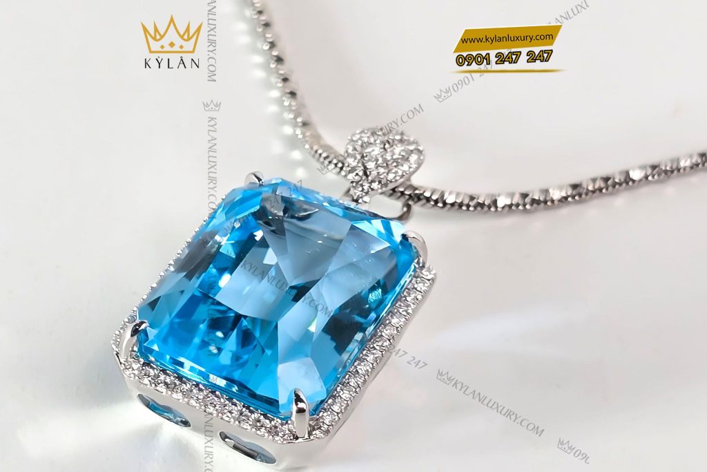Dây chuyền vàng trắng nguyên khối Au750 đính viên chủ đá quý Topaz 2 Dây chuyền vàng trắng nguyên khối Au750 đính viên chủ đá quý Topaz