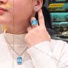 Nhẫn vàng trắng nguyên khối Au750 đính viên chủ đá quý Topaz
