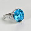 Kỳ Lân Luxury LOGO NHAN Nhẫn vàng trắng nguyên khối Au750 đính viên chủ đá quý Topaz