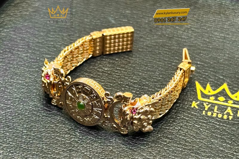 Lắc tay rồng vàng hồng nguyên khối Au750 đính đá xanh phong thủy