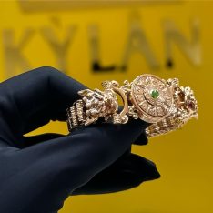 Lắc tay rồng vàng hồng nguyên khối Au750 đính đá xanh phong thủy