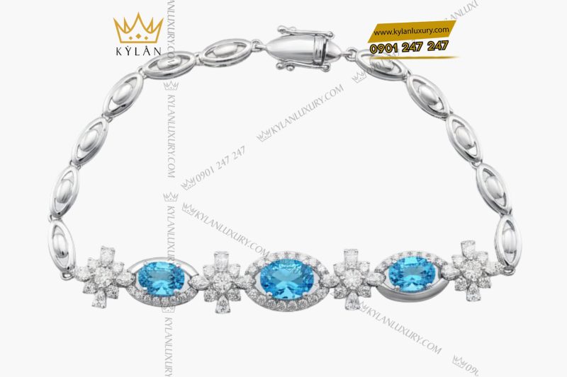 Lắc tay vàng trắng nguyên khối Au750 đính kim cương và đá quý