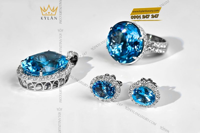 Mặt dây chuyền kim cương vàng trắng nguyên khối Au750 đính đá Topaz xanh