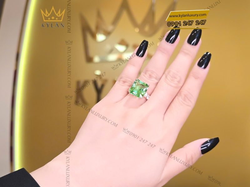 Nhẫn kim cương vàng hồng nguyên khối Au750 đính đá sapphire xanh