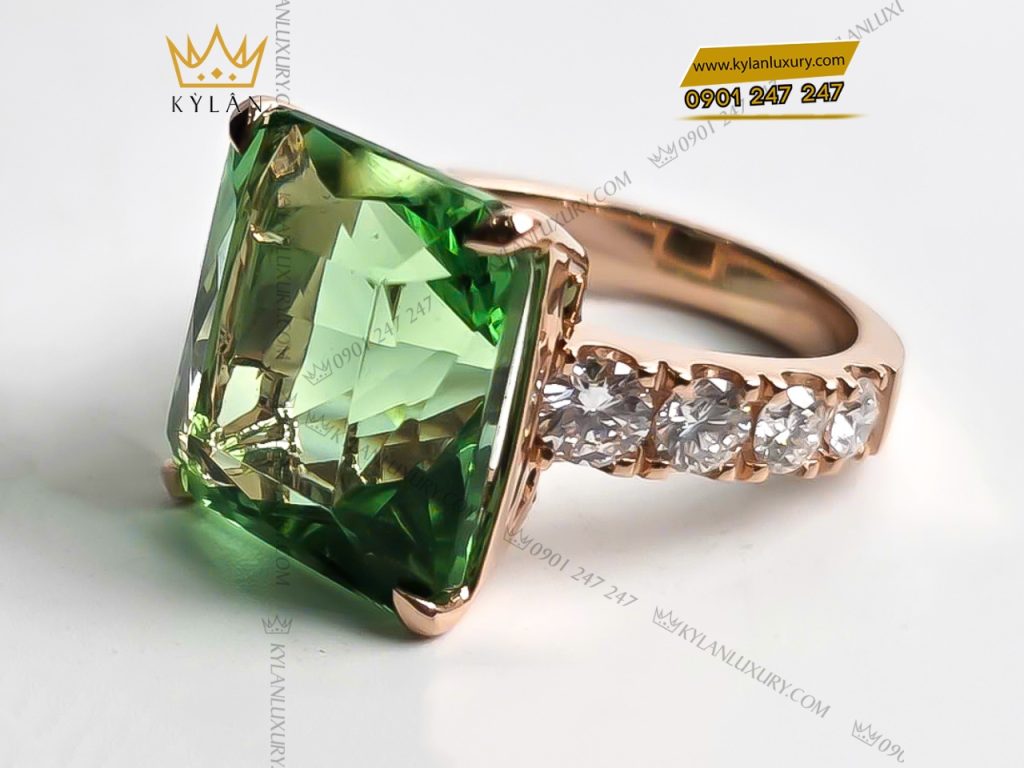 Nhẫn kim cương vàng hồng nguyên khối Au750 đính đá sapphire xanh