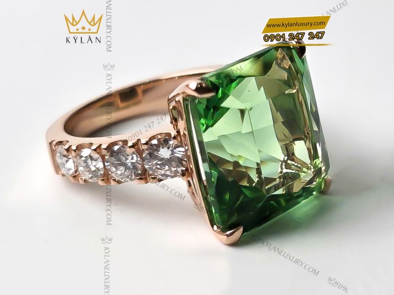 Nhẫn kim cương vàng hồng nguyên khối Au750 đính đá sapphire xanh