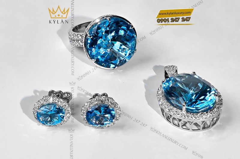 Bông tai kim cương vàng trắng nguyên khối Au750 đính đá Topaz xanh