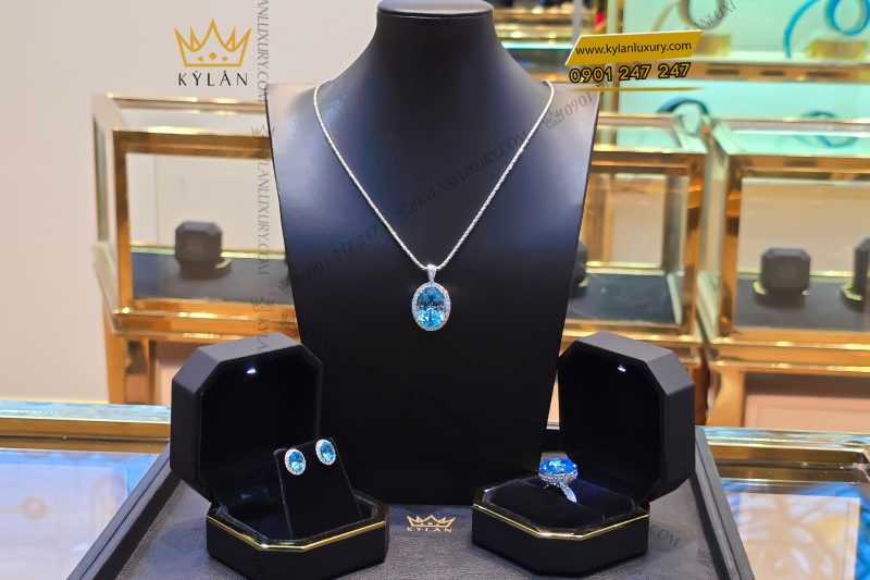 Bông tai kim cương vàng trắng nguyên khối Au750 đính đá Topaz xanh