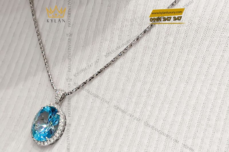 Mặt dây chuyền kim cương vàng trắng nguyên khối Au750 đính đá Topaz xanh