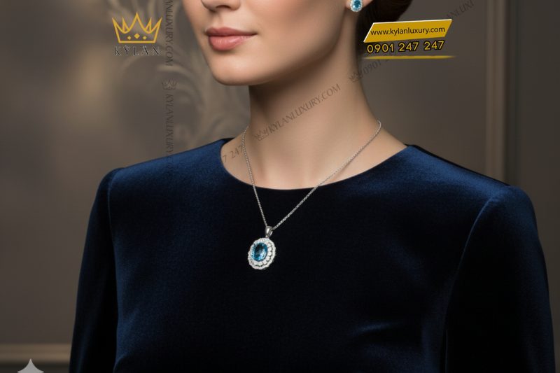 Dây chuyền vàng trắng Au750 kim cương và đá Topaz xanh