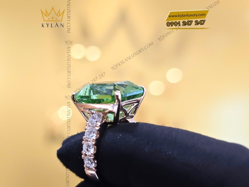 Nhẫn kim cương vàng hồng nguyên khối Au750 đính đá sapphire xanh