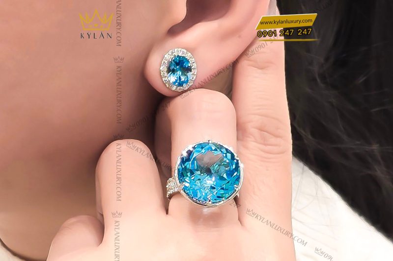 Bông tai kim cương vàng trắng nguyên khối Au750 đính đá Topaz xanh