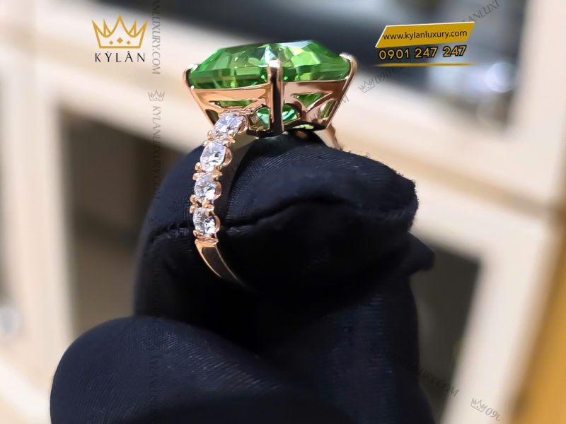 Nhẫn kim cương vàng hồng nguyên khối Au750 đính đá sapphire xanh