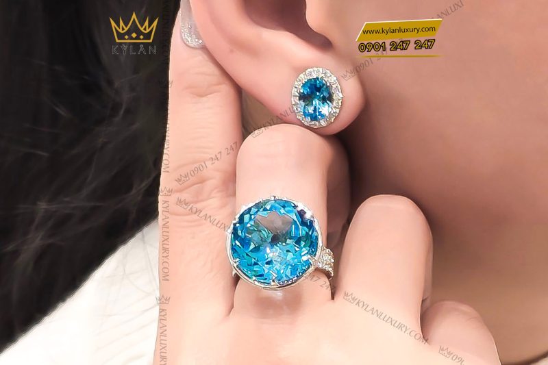 Bông tai kim cương vàng trắng nguyên khối Au750 đính đá Topaz xanh