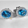 Bông tai kim cương vàng trắng nguyên khối Au750 đính đá Topaz xanh