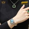 Nhẫn vàng trắng nguyên khối Au750 đính kim cương và đá ngọc lục bảo