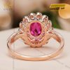 Nhẫn nữ vàng hồng nguyên khối Au750 đính kim cương và đá ruby 
