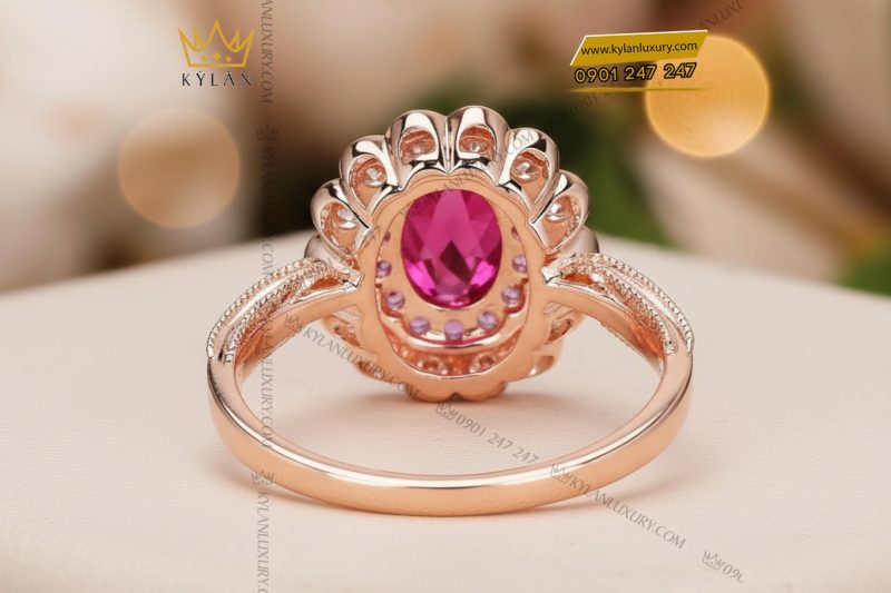 Nhẫn nữ vàng hồng nguyên khối Au750 đính kim cương và đá ruby 
