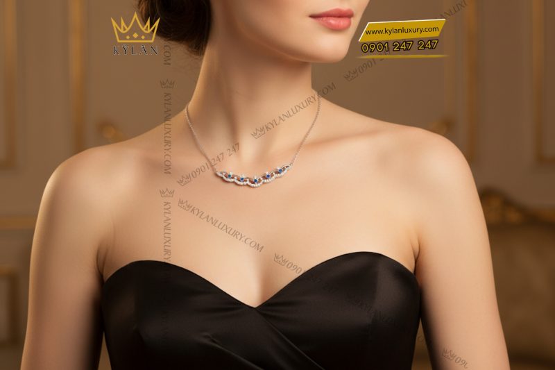 Dây chuyền vàng trắng nguyên khối Au750 đính kim cương và đá Topaz xanh