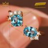 Nhẫn nữ vàng nguyên khối Au750 đính hai viên chủ đá Topaz