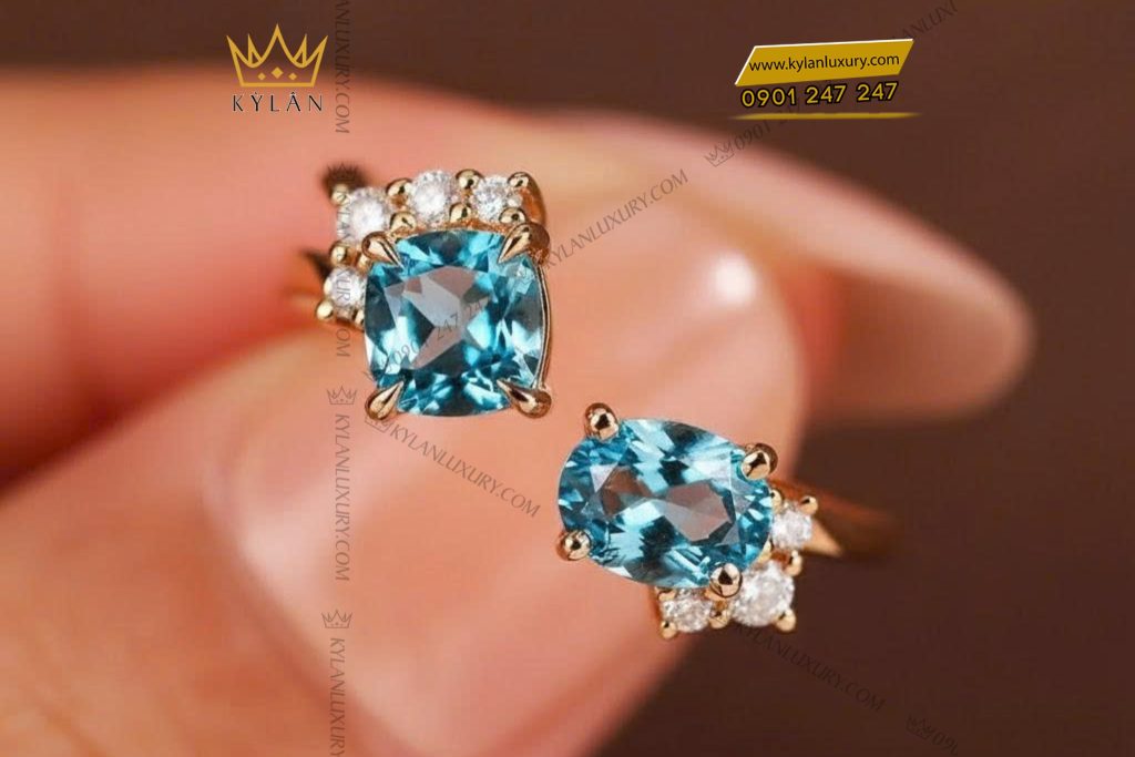 Nhẫn nữ vàng nguyên khối Au750 đính hai viên chủ đá Topaz