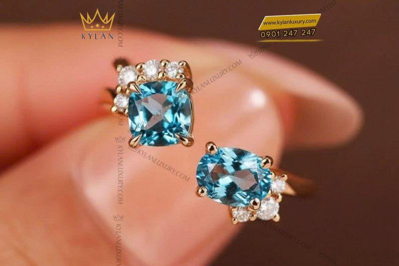 Nhẫn nữ vàng nguyên khối Au750 đính hai viên chủ đá Topaz