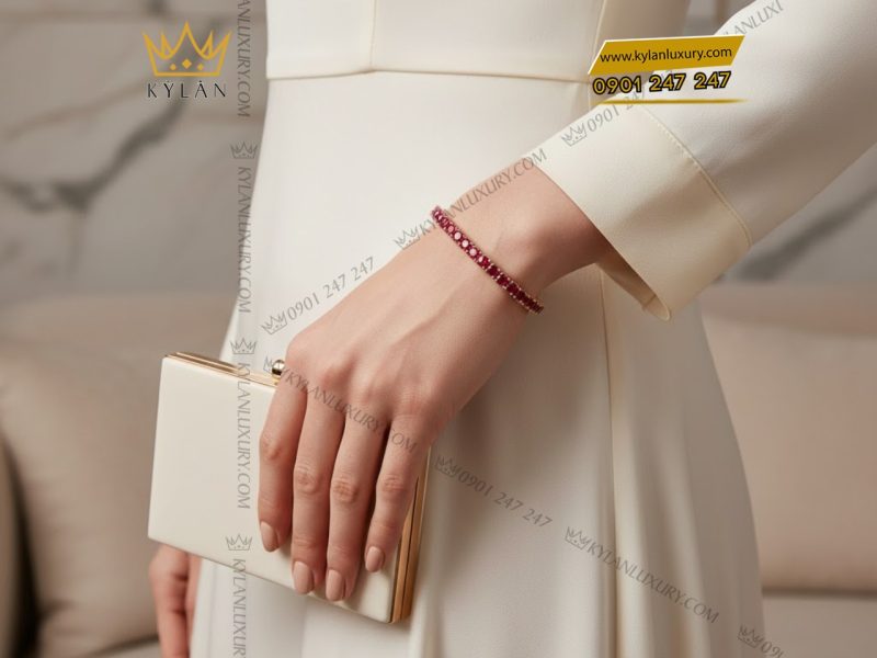 Lắc tay vàng hồng nguyên khối Au750 đính đá ruby