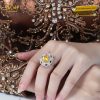 Nhẫn nữ vàng trắng nguyên khối Au750 đính kim cương và đá Sapphire vàng
