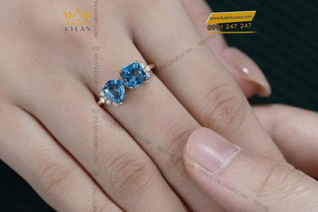 Nhẫn nữ vàng nguyên khối Au750 đính hai viên chủ đá Topaz