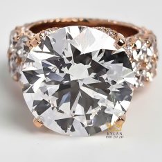 Nhẫn nữ vàng hồng nguyên khối Au750 đính viên kim cương chủ 15ly
