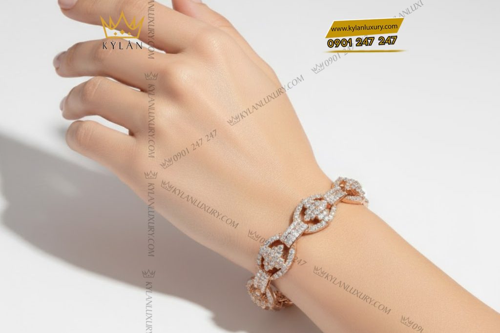 Lắc tay vàng hồng Au750 đính kim cương 